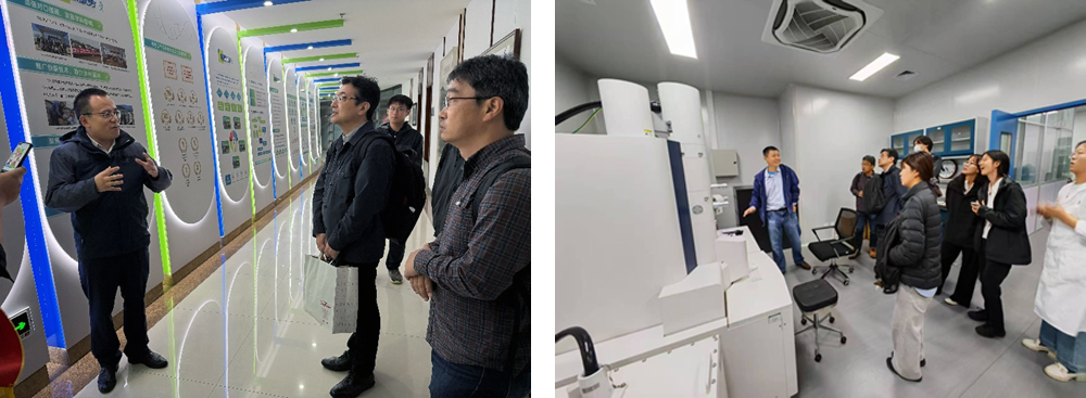 生物学院（生命科学研究院）の梁鵬博教授（写真左）による研究説明と実験施設見学の様子